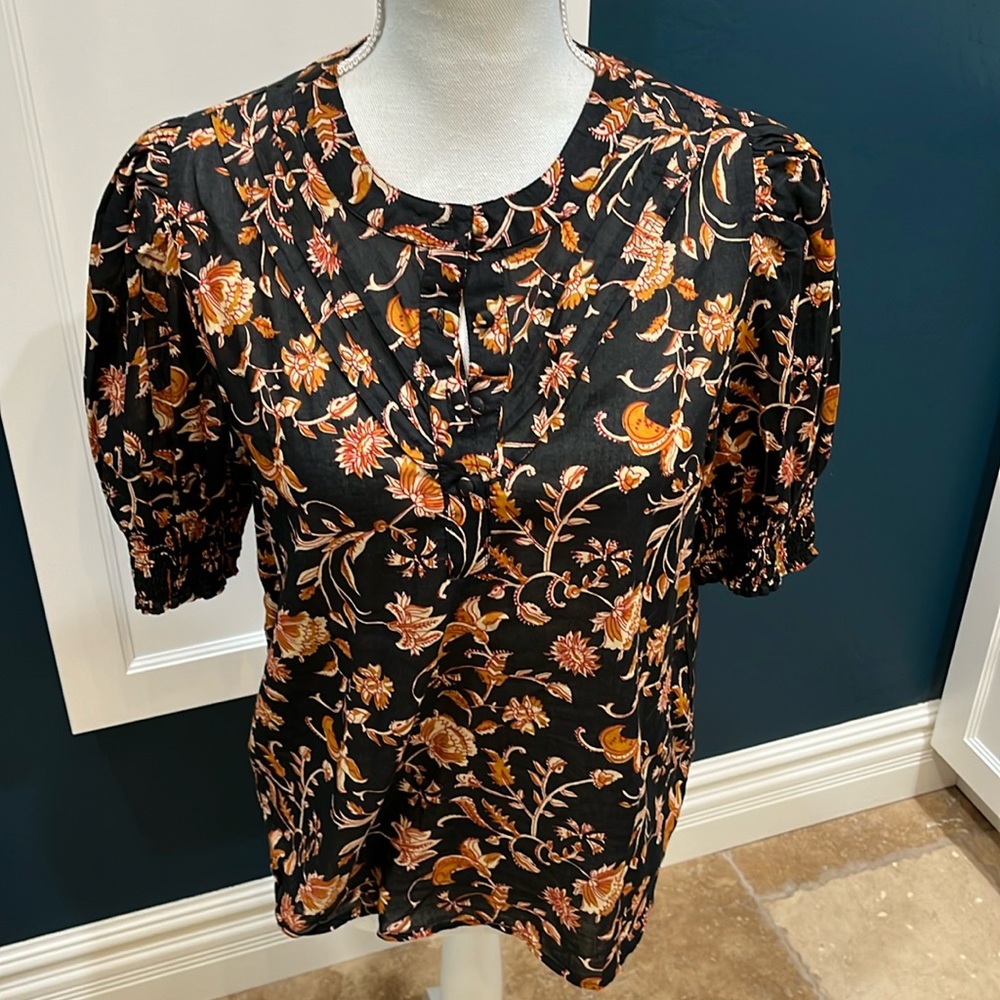 Anthropologie black short sleeve blouse.